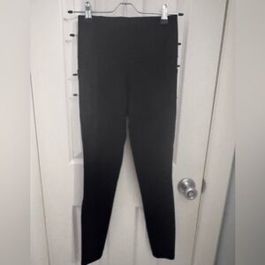 Athleta Black Salutation Stash Tight Leggings